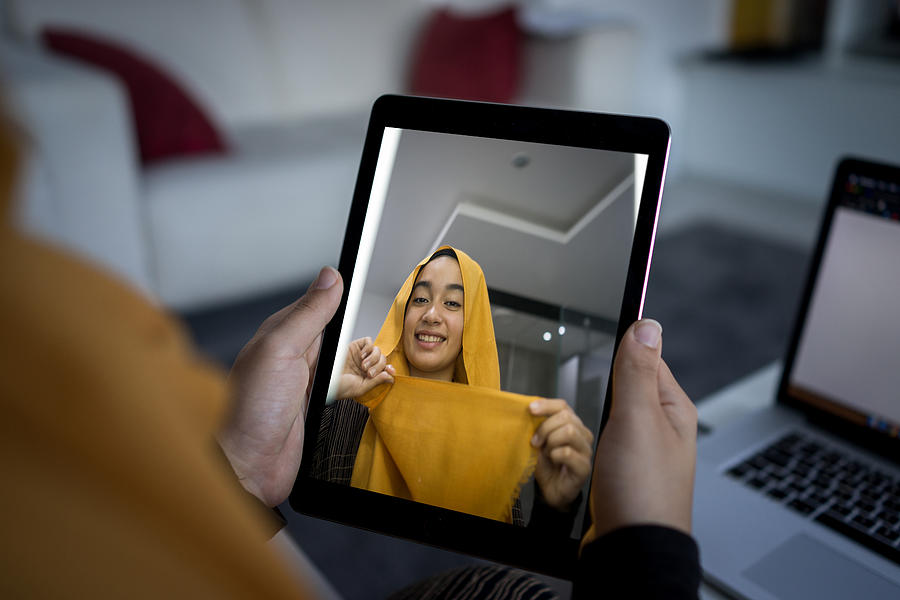 Learning from Muslim vlogger how to put Hijab on Photograph by Jasmin Merdan