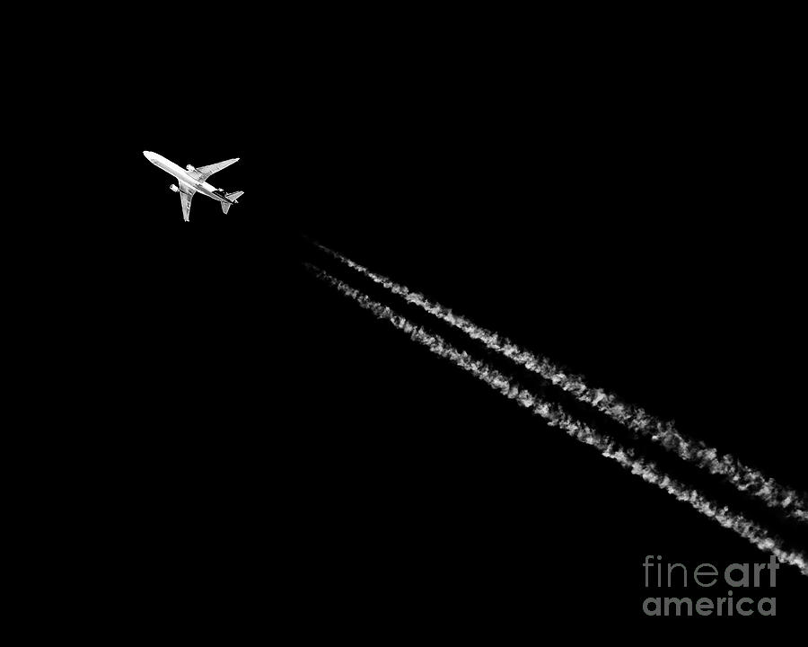 Leaving On a Jet Plane Photograph by Karen Slagle