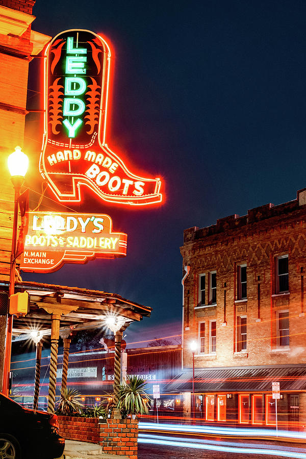 Leddy Boots Lighting Up The Stockyards - A Fort Worth Icon At Dawn Photograph by Gregory Ballos