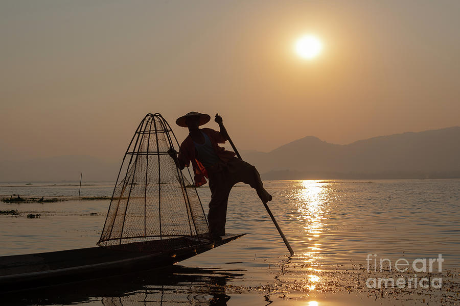 Leg rowing fisherman on Inle lake, Myanmar Photograph by Delphimages Photo Creations
