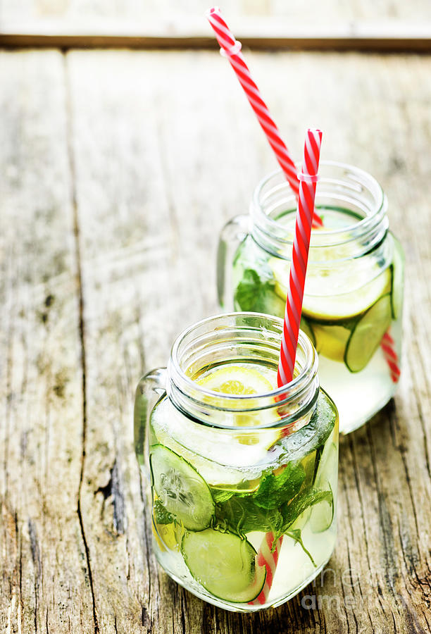 Lemon and cucumber beverage in retro jars Photograph by Jelena Jovanovic