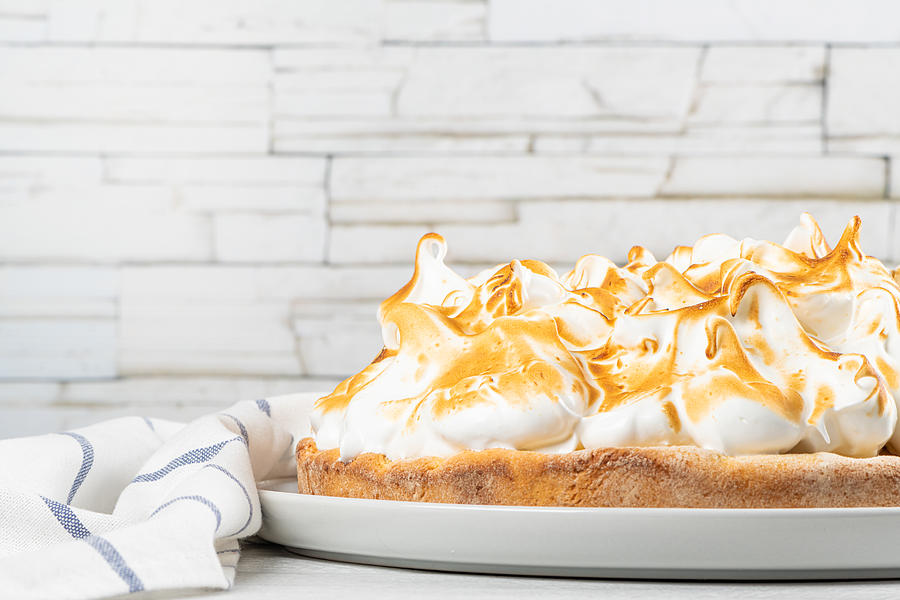 Lemon tart pie with meringue cream. Traditional American cake. Homemade baking. Copy space Photograph by AnaMOMarques