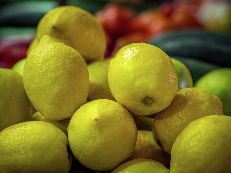 Lemons in the Market Photograph by Luis Vasconcelos