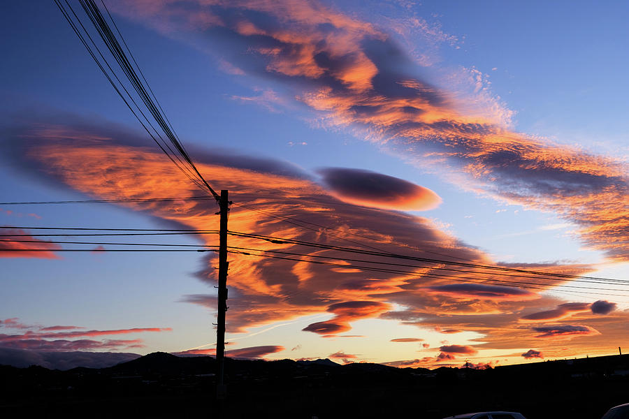 Lenticular clouds Photograph by Gary Browne