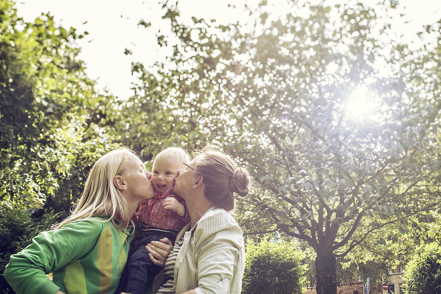 Lesbian family with baby boy Photograph by David Trood