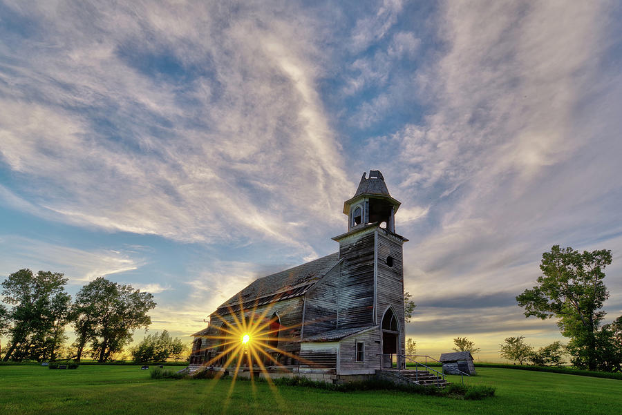 Let your Light Shine Through -  Hurricane Lake Lutheran Church in Pierce County ND Photograph by Peter Herman