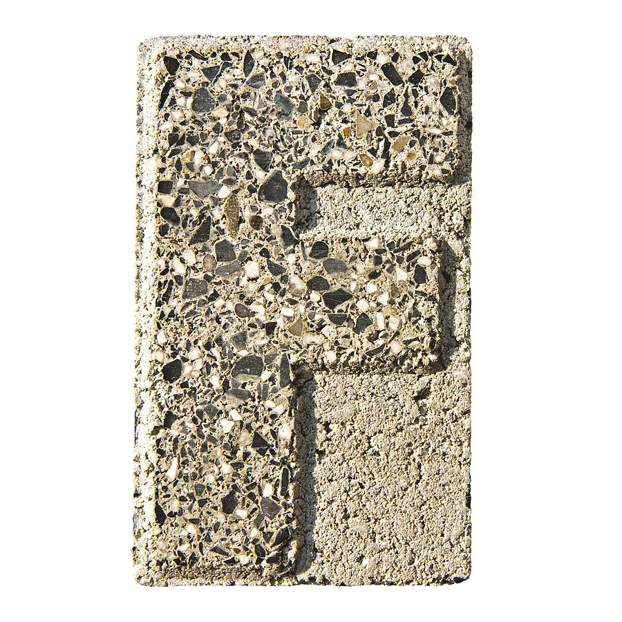 Letter F carved in a concrete block Photograph by France68