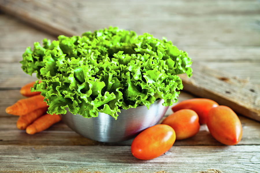 Lettuce Salad In Metal Bowl, Tomatoes And Carrots Photograph by Liss ...