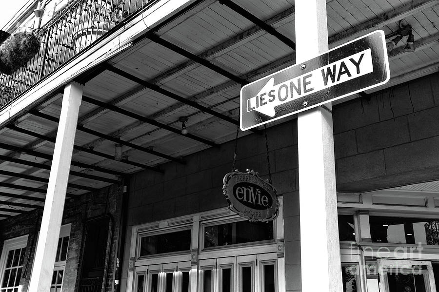 Lies One Way in New Orleans Photograph by John Rizzuto
