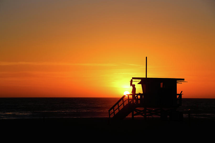 Lifeguard at sunset in Los Angeles Photograph by Alberto Zanoni