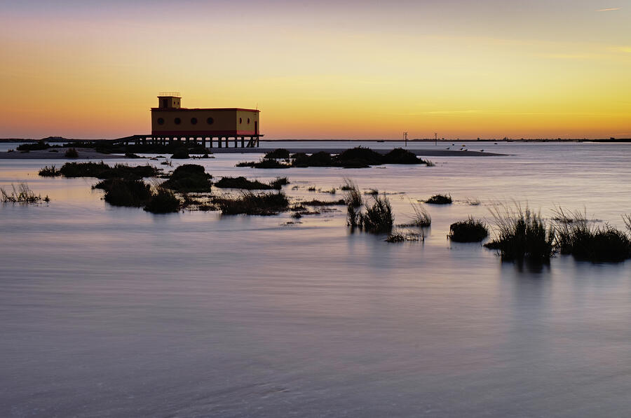 Sunset Photograph - Lifesavers building at dusk in Fuzeta. Portugal by Angelo DeVal