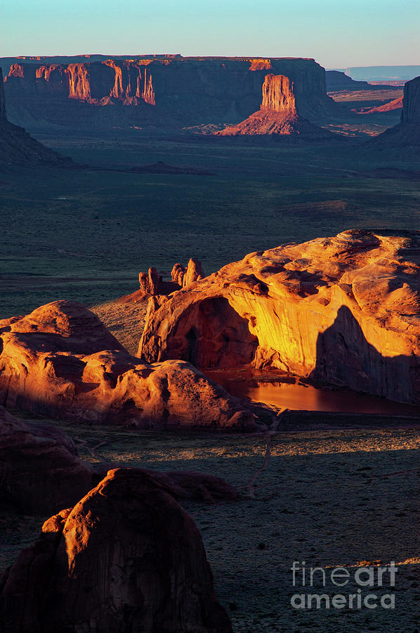 Light and Shadows in Monument Valley Photograph by Bob Phillips