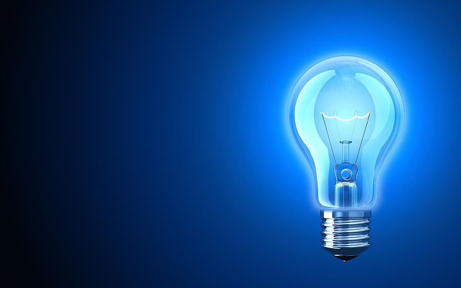 Light bulb providing blue light Photograph by BlackJack3D