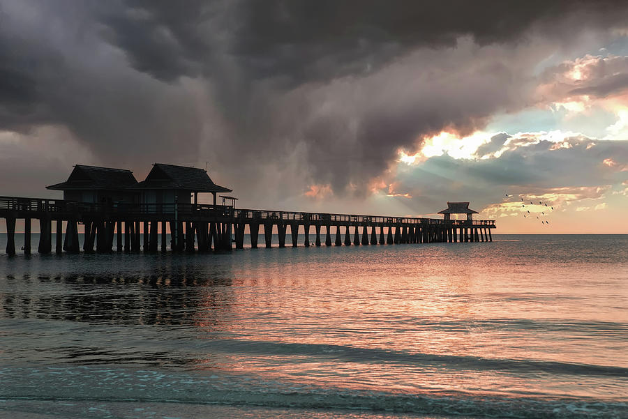 Sunset Photograph - Light On The Pier by Ed Taylor