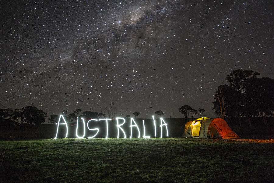 Light painting the word Australia in the Outback. Photograph by David Trood