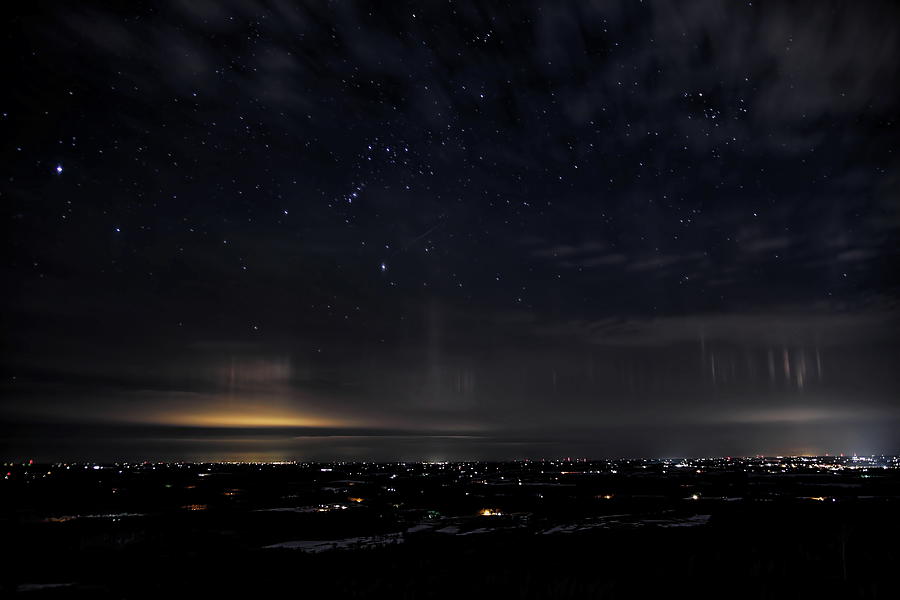 Light Pillars From Rib Mountain State Park Photograph by Dale Kauzlaric