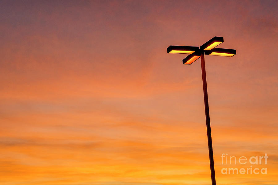 Architecture Photograph - Light pole glowing at dusk  San Diego, California by Julia Hiebaum