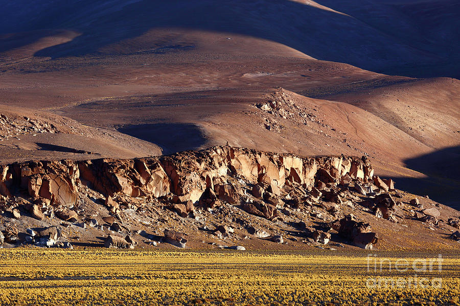Light shadow and rocks in the Puna de Atacama Chile Photograph by James Brunker