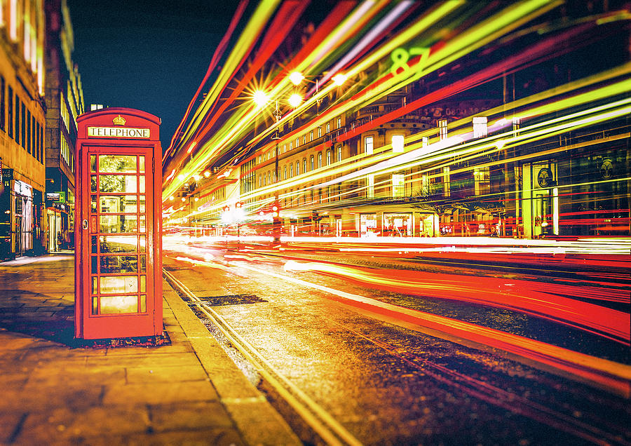 Light Streaks and a Telephone Booth Photograph by Joseph S Giacalone