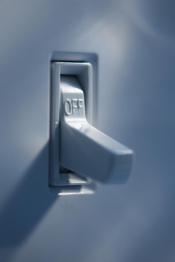 Light switch Photograph by Tetra Images