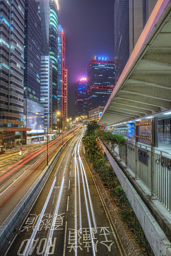Light trails in Central, Hong Kong Photograph by Daniel Chui