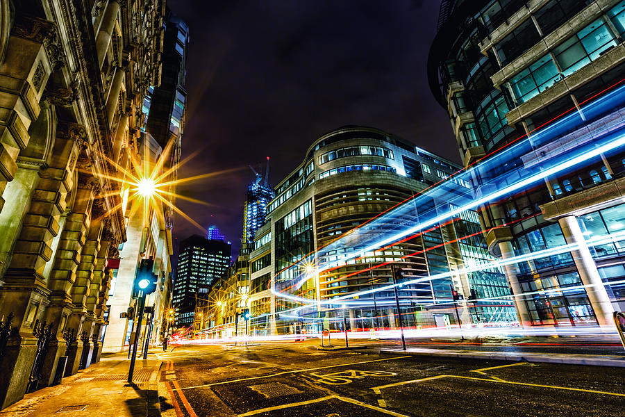 Light trails in City of London at night Photograph by Mbbirdy