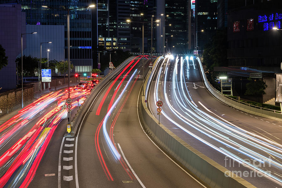 Light trails on road in Hong Kong Photograph by Visions Of Asia Visions of Asia