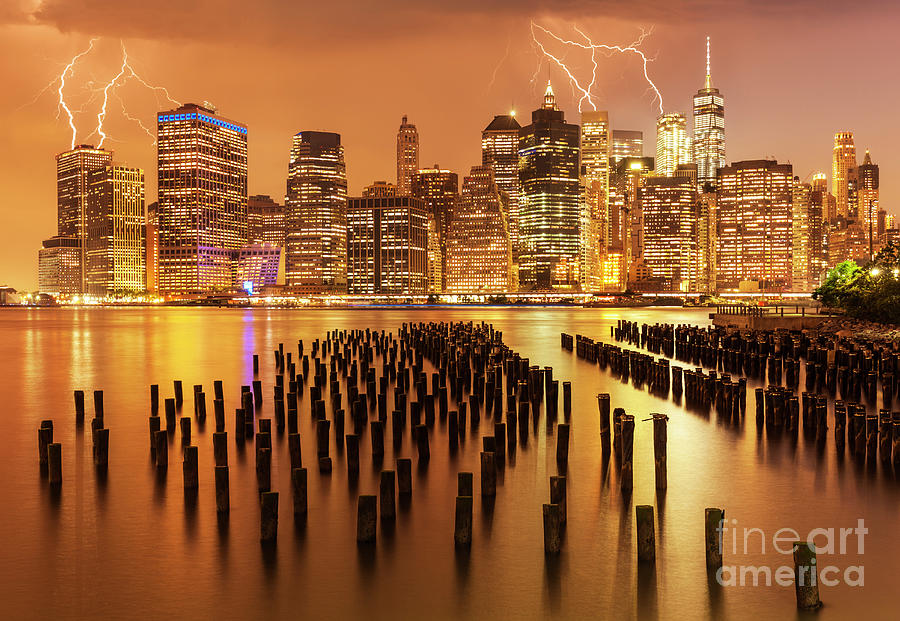 Lightening Strikes over New York Skyline Photograph by Neale And Judith Clark