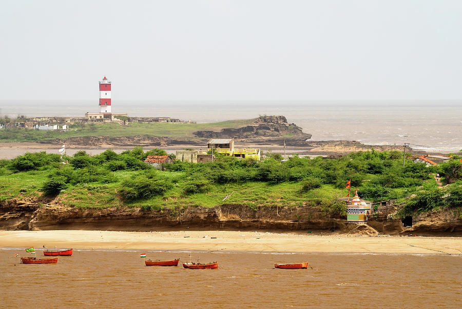 Lighthouse and Fishing Village on the Indian Island of Shiyal Bet Photograph by William Dickman