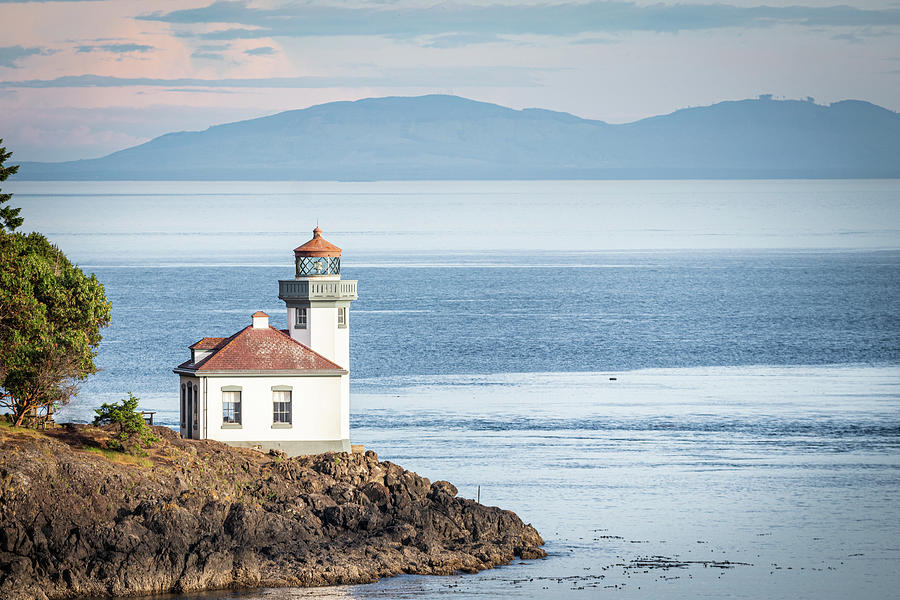 Lighthouse And Mountains Photograph by Jordan Hill