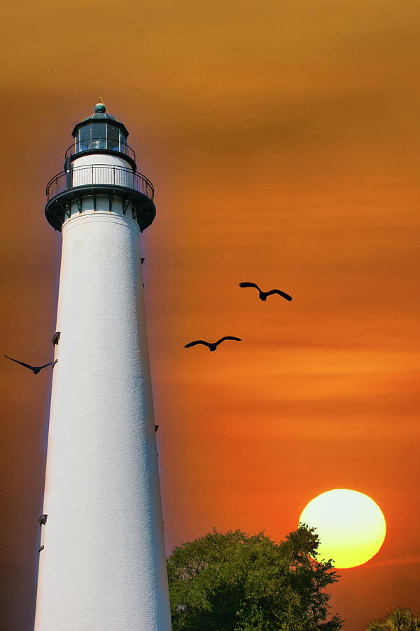 Lighthouse and Sun Photograph by Darryl Brooks