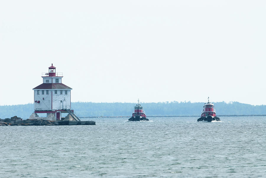 Lighthouse and two Tugboats Photograph by Jan Luit