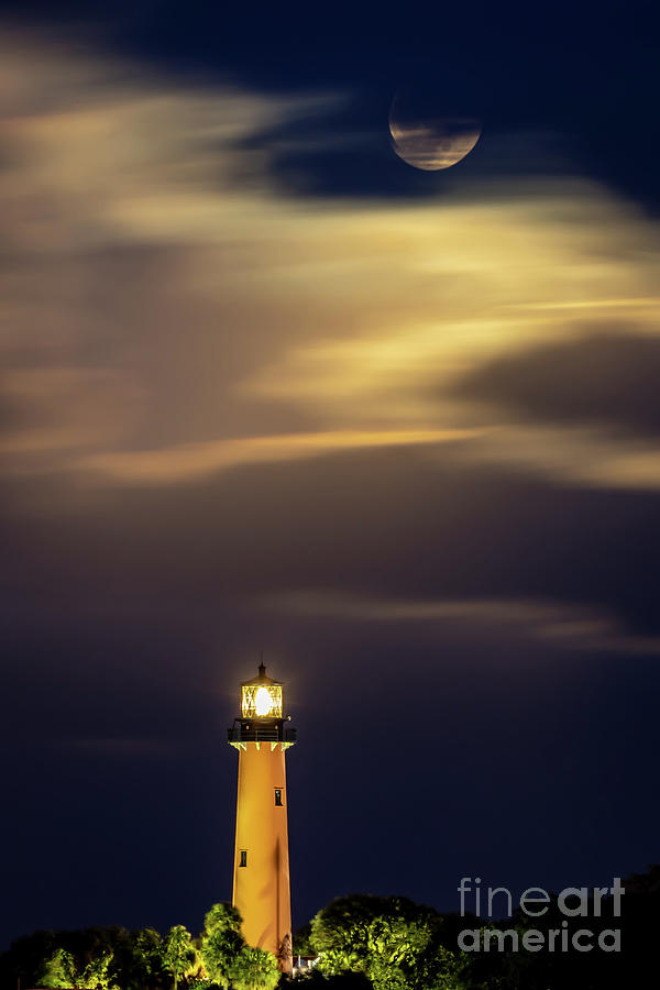 Lighthouse and Wolf Moon Photograph by Tom Claud