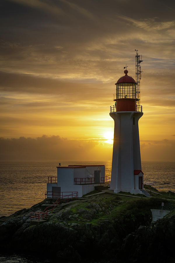 Lighthouse at Sunset Photograph by Bill Cubitt