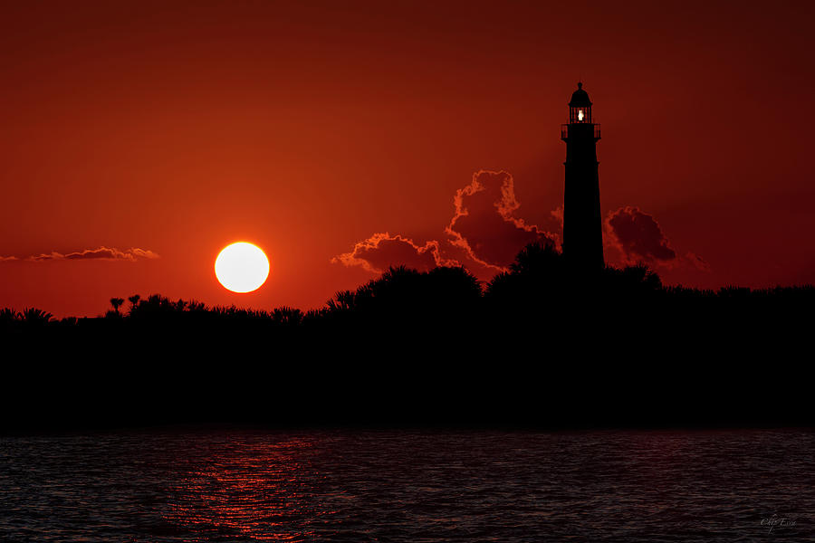 Lighthouse At Sunset Photograph by Chip Evra