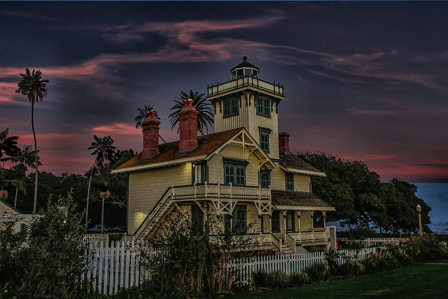 Lighthouse at Sunset Photograph by Robert Hebert