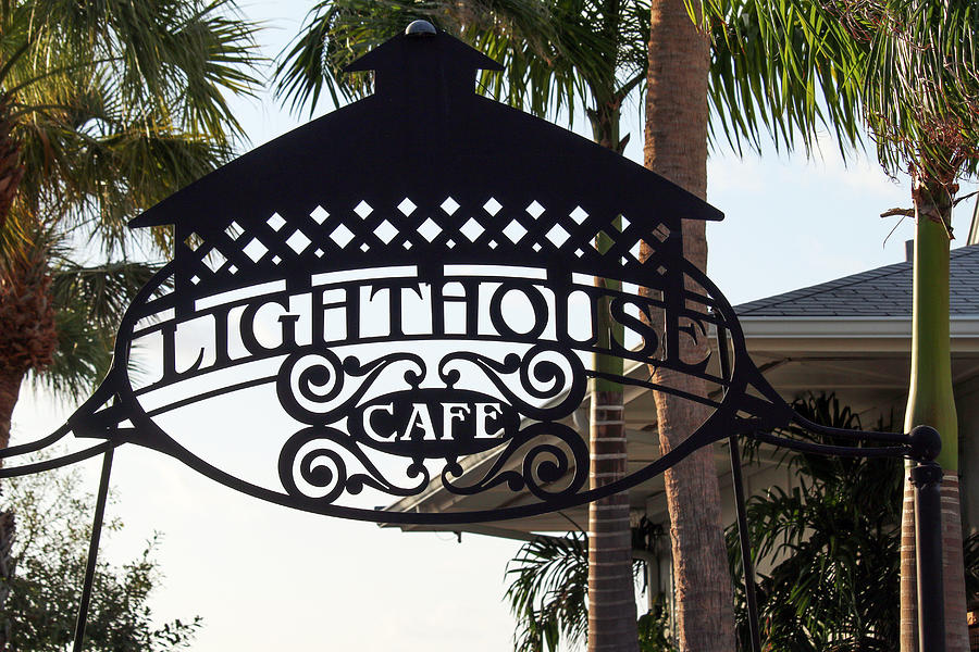 Lighthouse Cafe Sign Photograph by Art Block Collections