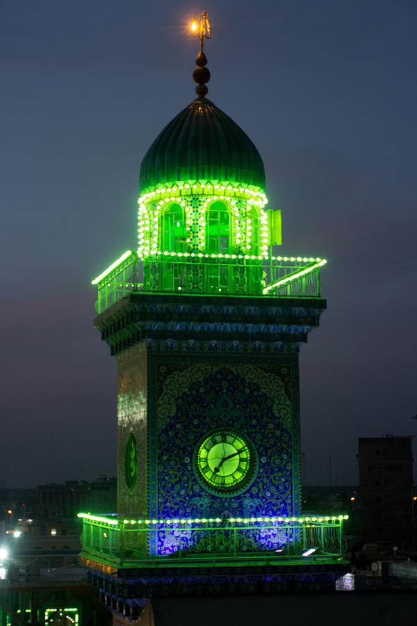 Lighthouse clock tower in Al-Kadhimiya Mosque Photograph by Rasool Ali
