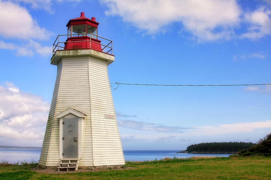 Lighthouse in Gabarus, Nova Scotia Photograph by Tatiana Travelways