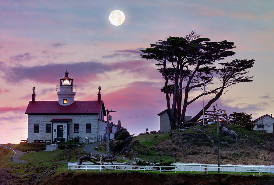 Lighthouse Moon Photograph by Leland D Howard