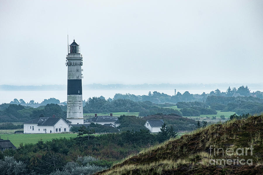 Lighthouse on the Sylt from duna Photograph by Marina Usmanskaya