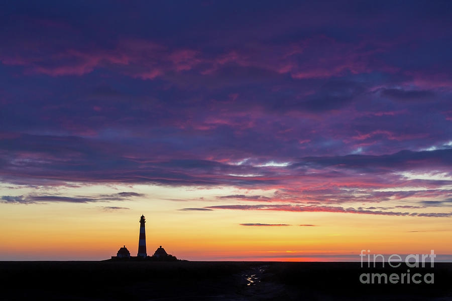 Lighthouse Westerheversand at Sunset Photograph by Arterra Picture Library