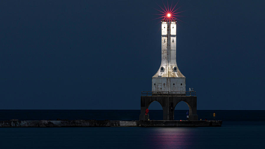 Lighting The Lighthouse Photograph by Jeffrey Ewig