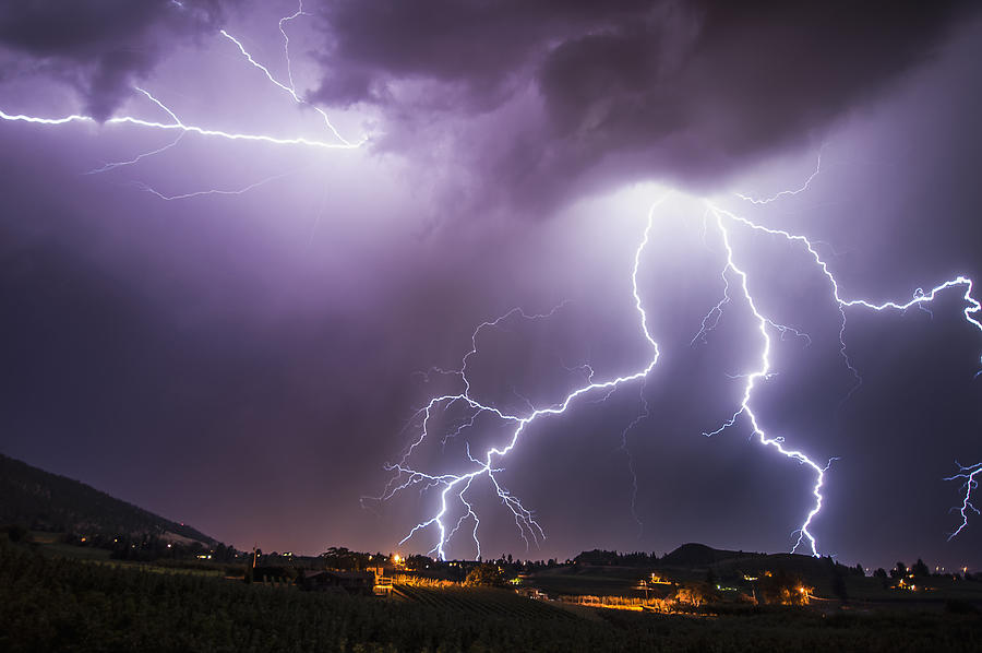 Lightning bolts over south Okanagan Valley, Penticton, British Columbia, Canada Photograph by Preserved Light Photography