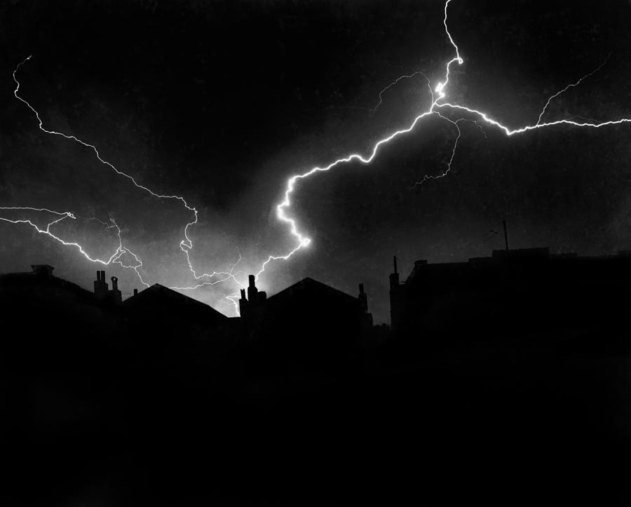 Lightning Storm At Night With Silhouetted Houses - 1923 Photograph by War Is Hell Store