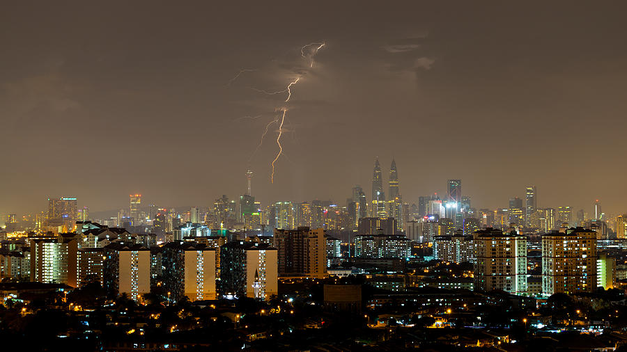 Lightning strike in Kuala Lumpur, Malaysia Photograph by Shaifulzamri