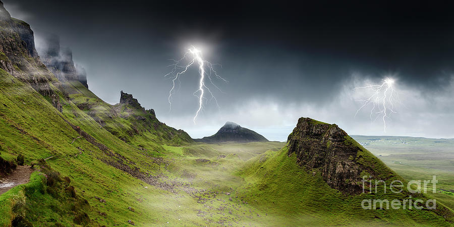 Lightning strikes over the Quiraing, Skye. Photograph by Phill Thornton