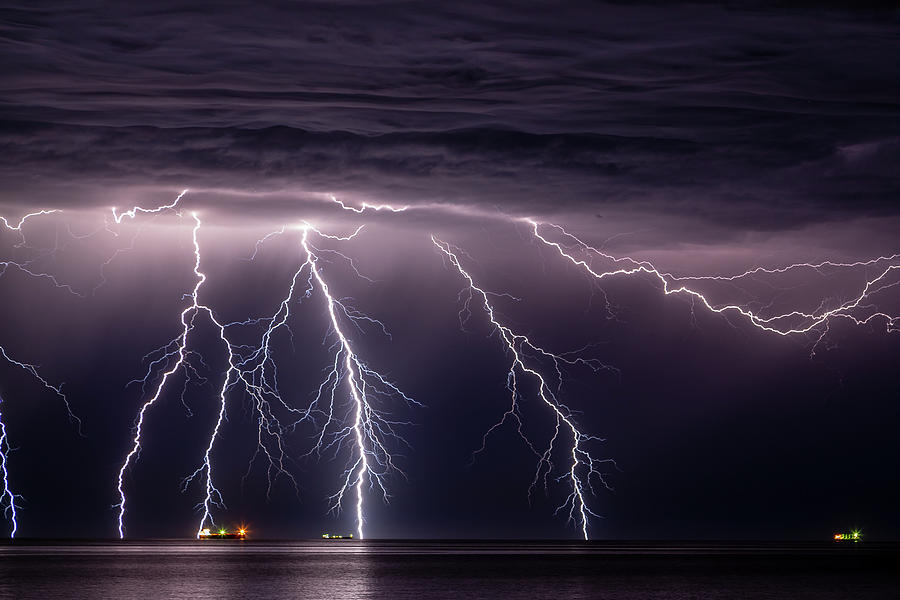Lightning Strikes Photograph by Robert Caddy
