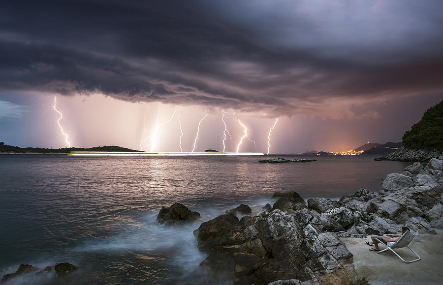 Lightning watcher Photograph by Image by Chris Winsor