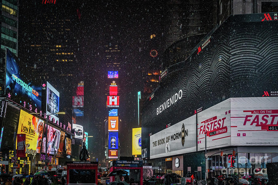 Lights on billboards and advertisements at Times Squre, New York City on a rainy night Photograph by Izet Kapetanovic